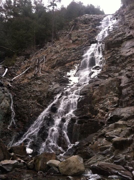 Waterfall cascading down rocky slope